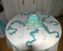 Not only is the cake decorated according to theme, but so is the table top.